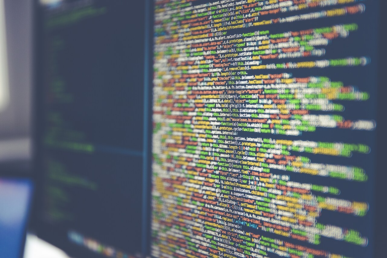 Lines of code on a computer monitor illustrating how web pages load